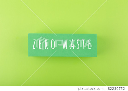 Modern composition with zero waste inscription against light green background Modern composition with zero waste inscription against light green background 82230752