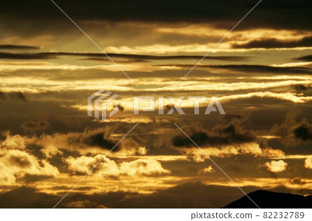 Early autumn morning sky, clouds illuminated by the morning sun 82232789
