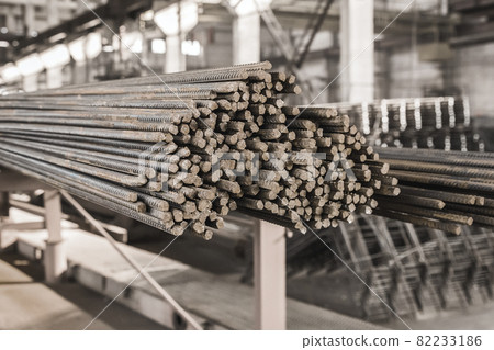Reinforcement of concrete structures on plant. Armature storage materials in industrial workshop. Fitting manufacturing Reinforcement of concrete structures on plant. Armature storage materials in industrial workshop. Fitting manufacturing 82233186