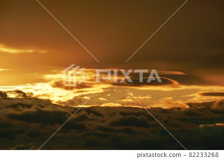 Early autumn morning sky, clouds illuminated by the morning sun 82233268