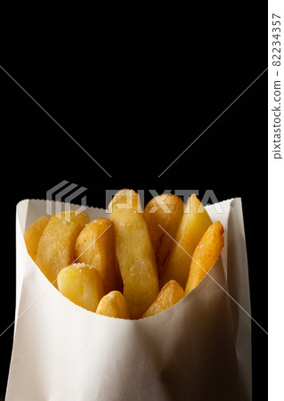 French fries on black background 82234357