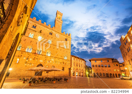 Volterra, Tuscany - Piazza dei Priori sunrise twilight. 82234994