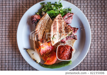 Shish Kebab restaurant plate in Wadi Musa, Jordan. 82235006