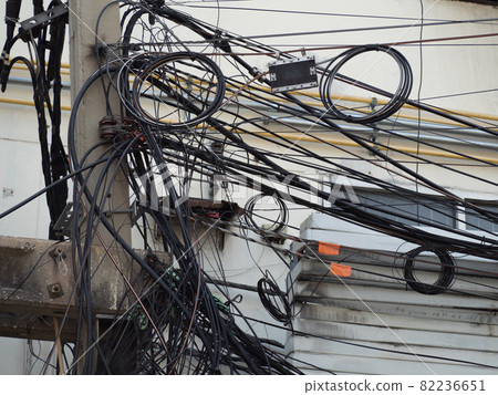 Many electrical cable, wire, telephone line and CCTV on electricity pole Many electrical cable, wire, telephone line and CCTV on electricity pole 82236651