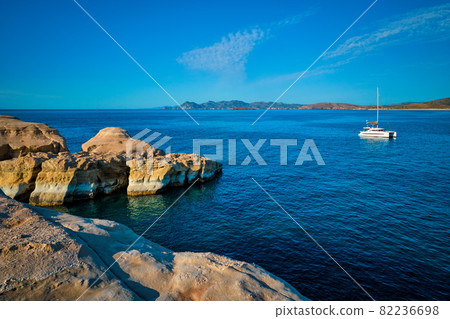 Yacht boat at Sarakiniko Beach in Aegean sea, Milos island , Greece 82236698