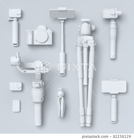 Top view of monochrome designer workspace and photography gear on black table 82238129