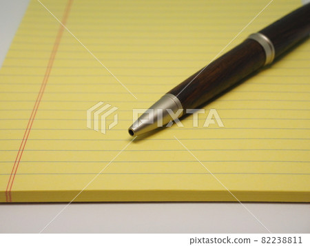 Report paper and wooden ballpoint pen Report paper and wooden ballpoint pen 82238811