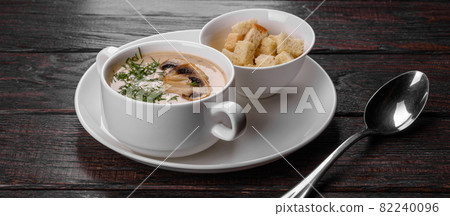 Cream of mushroom soup. Home-made with whole and sliced mushrooms Cream of mushroom soup. Home-made with whole and sliced mushrooms 82240096
