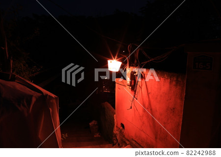 Evening. Light. Streetlight. Night view. Moon village. Alley Evening. Light. Streetlight. Night view. Moon village. Alley 82242988