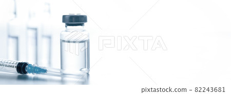 Medical syringe with a needle and a bollte with vaccine. Medical syringe with a needle and a bollte with vaccine. 82243681