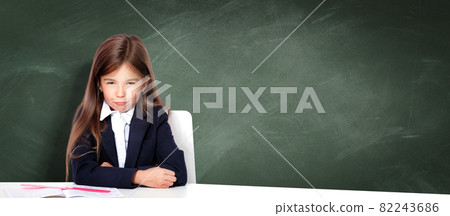 Frustrated and unhappy teen girl at school. Frustrated and unhappy teen girl at school. 82243686