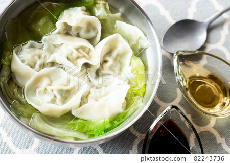 Handmade dumplings wrapped in a hat 82243736