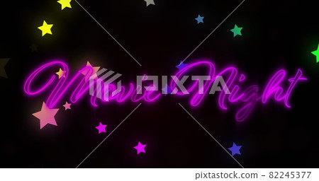Digitally generated image of movie night neon text and multi colored stars moving against black back Digitally generated image of movie night neon text and multi colored stars moving against black back 82245377