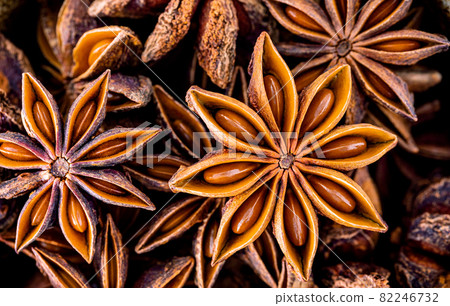 Chinese star anise close up background. Dried star anise spice fruits top view.. 82246732