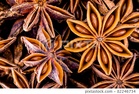 Chinese star anise close up background. Dried star anise spice fruits top view.. 82246734