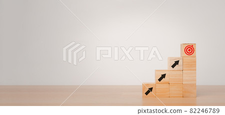 Virtual target board and arrow which icon on wooden cube with copy space, Target and goal as concept, Business achievement goal. 82246789