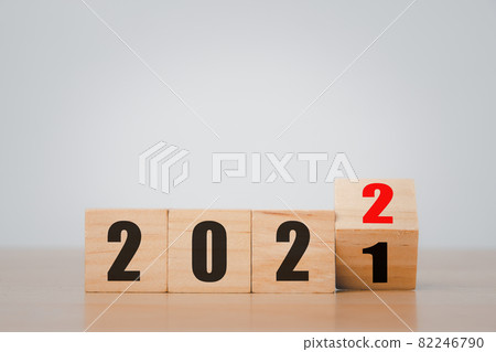 Wooden blocks with 2021 2022 number on wooden table with copy space, New year, Merry christmas. Wooden blocks with 2021 2022 number on wooden table with copy space, New year, Merry christmas. 82246790