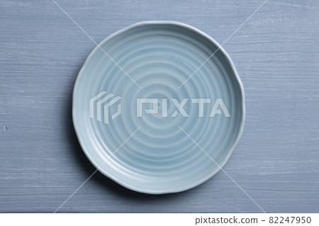 Blue swirl plate background material 82247950
