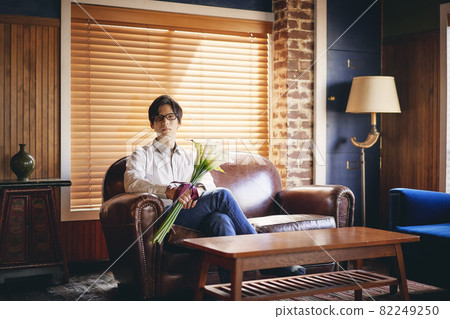 Male portrait with flowers 82249250
