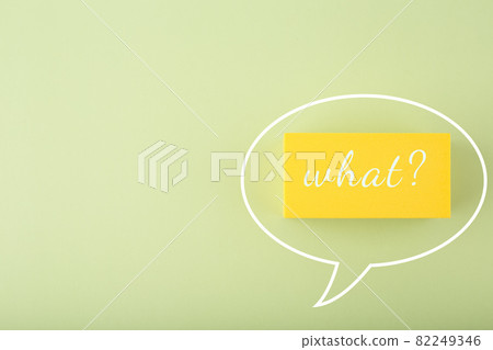 Speech bubble with what question on bright green background  82249346