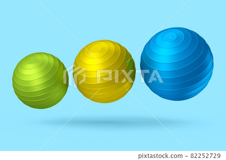 Multicolor fitball or fitness ball for yoga exercise isolated blue background Multicolor fitball or fitness ball for yoga exercise isolated blue background 82252729
