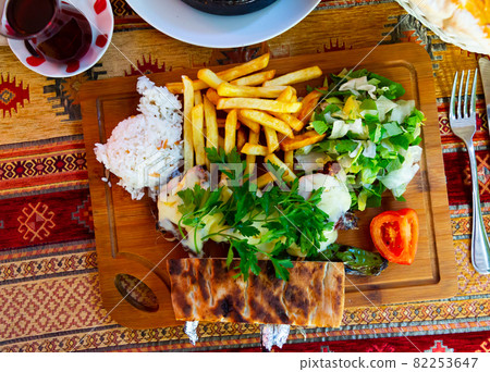 Grilled lamb ribs with cheese Grilled lamb ribs with cheese 82253647