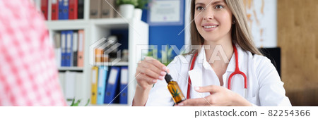 Doctor passes marijuana oil to woman patient 82254366