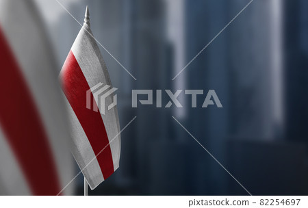 Small flags of Belarus on a blurry background of the city Small flags of Belarus on a blurry background of the city 82254697