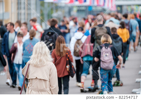 Crowd of people on the street. Summer day Crowd of people on the street. Summer day 82254717