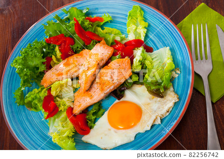 Light dietary breakfast of trout fillet 82256742
