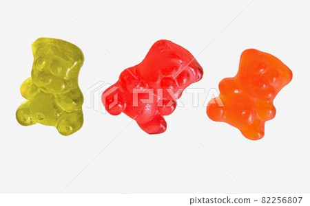Dancing colorful jelly gummy bears, isolated on white background. Multicolored jelly bears candy isolated on a white background. Jelly Bean Dancing colorful jelly gummy bears, isolated on white background. Multicolored jelly bears candy isolated on a white background. Jelly Bean 82256807