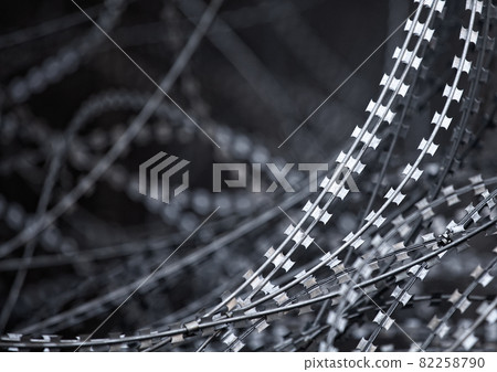 Barbed wire in grunge style process. Barbed wire in grunge style process. 82258790