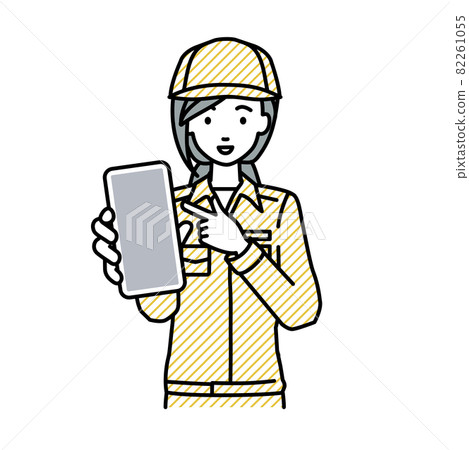 A female worker standing and pointing at her smartphone A female worker standing and pointing at her smartphone 82261055