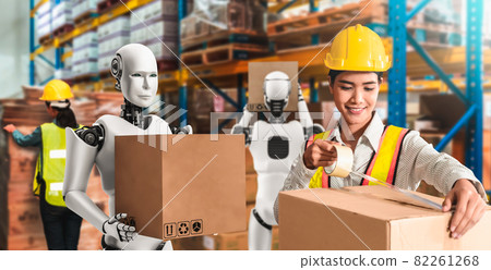 Innovative industry robot working in warehouse together with human worker Innovative industry robot working in warehouse together with human worker 82261268