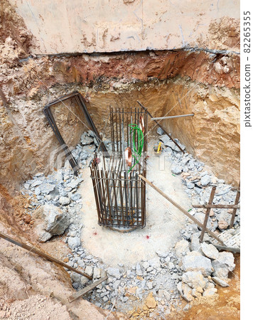 PENANG, MALAYSIA -SEPTEMBER 2, 2021: The process of cutting piles after the completion of building foundation piling work. This work needs to be done before the construction of the cap pile is proceed PENANG, MALAYSIA -SEPTEMBER 2, 2021: The process of cutting piles after the completion of building foundation piling work. This work needs to be done before the construction of the cap pile is proceed 82265355