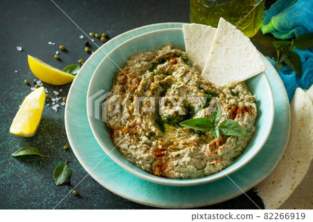 Homemade delicious and healthy protein vegan, vegetarian food, Ramadan food. Hummus with mung and tahini. Homemade delicious and healthy protein vegan, vegetarian food, Ramadan food. Hummus with mung and tahini. 82266919