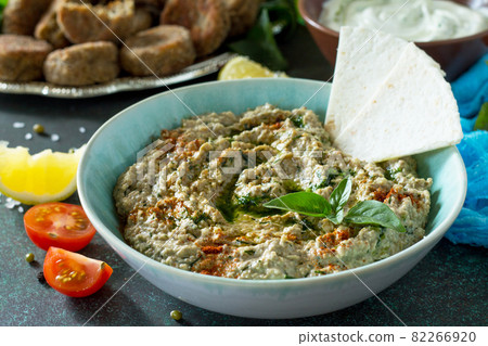 Homemade delicious and healthy protein vegan, vegetarian food, Ramadan food. Hummus with mung and tahini. Homemade delicious and healthy protein vegan, vegetarian food, Ramadan food. Hummus with mung and tahini. 82266920