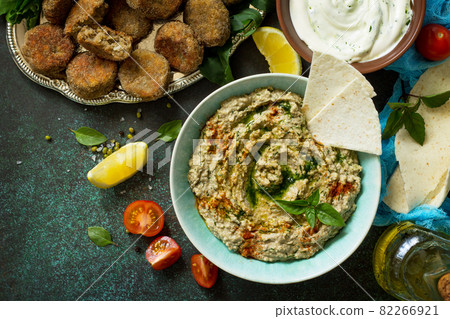 Homemade delicious and healthy protein vegan, vegetarian food, Ramadan food. Hummus with mung and tahini. Top view flat lay. Free space for your text. Homemade delicious and healthy protein vegan, vegetarian food, Ramadan food. Hummus with mung and tahini. Top view flat lay. Free space for your text. 82266921