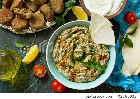 Homemade delicious and healthy protein vegan, vegetarian food, Ramadan food. Hummus with mung and tahini. Top view flat lay. 82266922