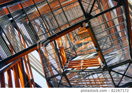 a fragment of the structure of a new modern metal observation tower with decorative wooden elements 82267172