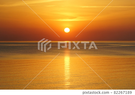 beautiful sunset in the baltic sea, sun above the horizon 82267189