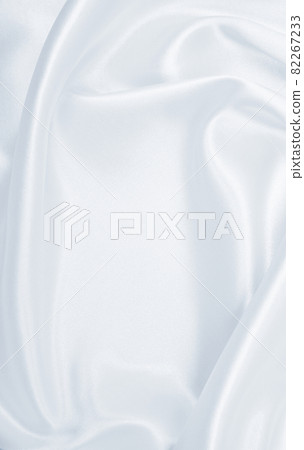 Smooth elegant grey silk or satin luxury cloth as wedding background. Luxurious background design Smooth elegant grey silk or satin luxury cloth as wedding background. Luxurious background design 82267233
