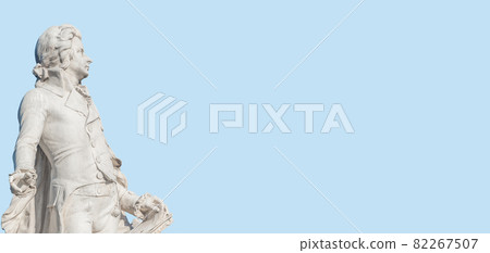 Banner with Mozart monument in historical downtown of Vienna, Austria at sunny day, blue sky with copy space for text, details 82267507