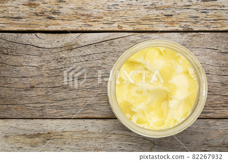 glass jar of ghee 82267932