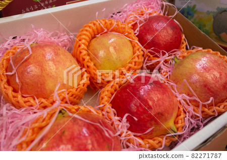 Pomegranates for sale on supermarket shelves Pomegranates for sale on supermarket shelves 82271787