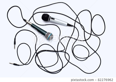 Two microphones on white background. 82276962