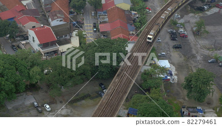 Bird eye view of poor district and riding train on railways Bangkok, Thailand 82279461