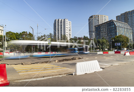 Modern tram on a Moscow street, Russia. To obtain a blur effect,an ND2 up to ND400 filter with adjustable neutral density is used. No other changes were made Modern tram on a Moscow street, Russia. To obtain a blur effect,an ND2 up to ND400 filter with adjustable neutral density is used. No other changes were made 82283855