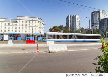 Modern tram on a Moscow street, Russia. To obtain a blur effect,an ND2 up to ND400 filter with adjustable neutral density is used. No other changes were made Modern tram on a Moscow street, Russia. To obtain a blur effect,an ND2 up to ND400 filter with adjustable neutral density is used. No other changes were made 82283870