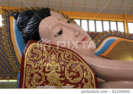 Lying buddha statue of Wat Chaiya Mangkalaram temple in Penang, Malaysia Lying buddha statue of Wat Chaiya Mangkalaram temple in Penang, Malaysia 82284600